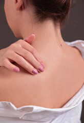 Naklejka premium Woman with back and neck pain. Spinal health concept