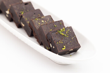 Indian Sweet Mithai Dark Double Chocolate Burfi, Barfi, Burfee Or Barfee Made Of Crumbled Condensed Milk Khoya, Cardamom, Mawa, Sugar, Simmering Coco Powder Mix With Pure Desi Ghee Or Clarified Butter
