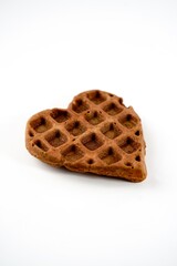 Homemade heart-shaped chocolate waffles isolated on white background | Valentine's heart waffles
