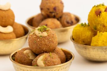 Indian Mithai Gud Churma Ke Laddu Or Choorma Ke Ladoo Is Made Of Whole Wheat Jada Gehun Ka Atta, Khus Khus, Gur, Jaggery, Kaju, Badam, Dry Fruits Roasted In Desi Ghee Or Clarified Butter