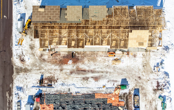 Aerial Drone View Of A Multifamily Apartment Complex Under Construction.