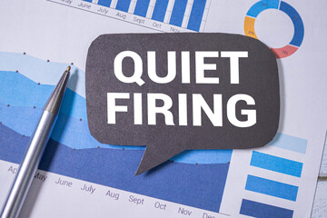 Office envelope with text QUIET FIRING, act of nudging an employee out of the workplace