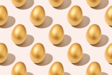 Golden Easter eggs on pink background, luxury seamless pattern.