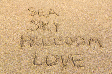 Sea, sky, freedom, love on sand