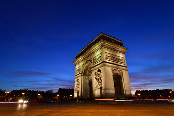 Obraz na płótnie Canvas Paris, France. Arc de Triomphe at dusk. February 5, 2023.
