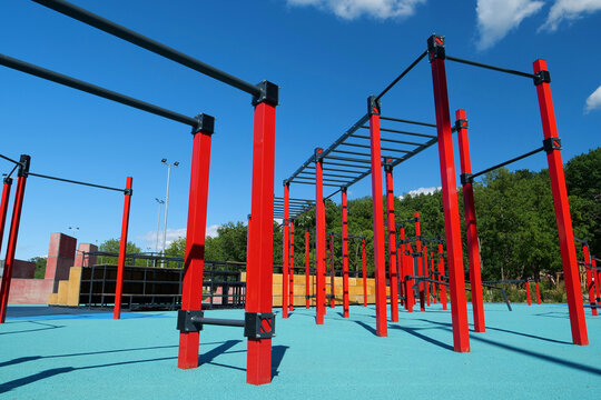 Sports ground with horizontal bars and other new exercise equipment