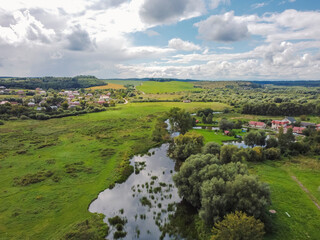 Aerial vIew of Khodoriv city by drone. Summer Ukraine Lviv region, West Ukraine. Lake.