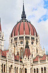 Hungarian Parliament Building in the evening at the Danube river in Budapest, Hungary. High quality photo