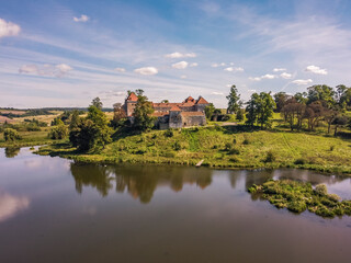 Fototapeta na wymiar Aerial view by drone. Summer. Svirzh Castle Ukraine Castles. Lakes. 