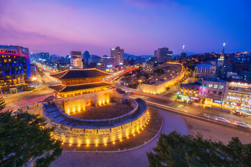 Dongdaemun Gate at night and Traffic in Seoul, South Korea.
