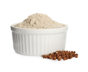 Bowl of buckwheat flour on white background