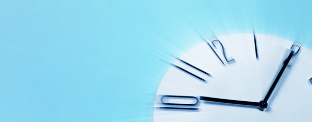Fleeting time concept. Clock on light blue background, motion effect. Banner design with space for...