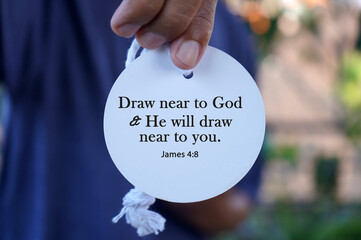 Bible verse quote - Draw near to God and He will draw near to  you. James 4:8 with person showing...
