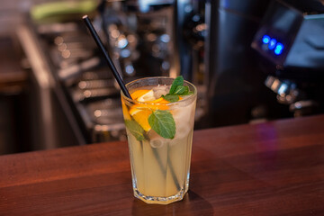 Cold drink from fresh fruits with ice in a coffee shop.