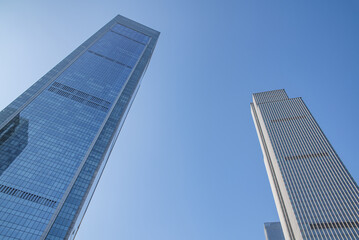 Fototapeta na wymiar Upward shot of city CBD building glass curtain wall landscape