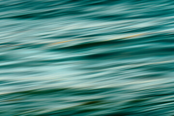 Ocean sunset. An abstract seascape background of stormy sea waves at sunse