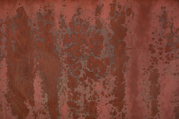 Seamless red crackle texture of the old painted metal door weathered with time.