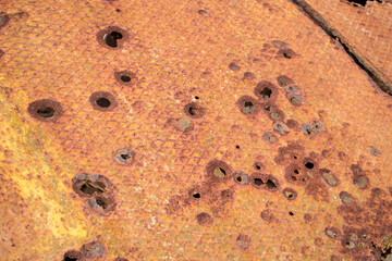 irregular rusty surface of an ancient boat