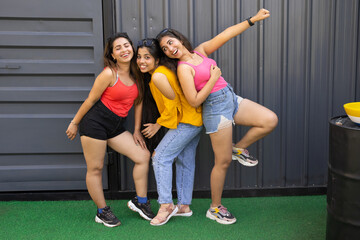 Portrait of beautiful indian women having fun party,Group of young girl friends in sunglasses and...