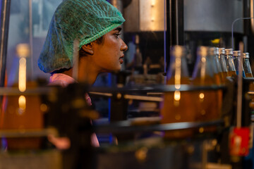 Soft drink factory workers production control production line