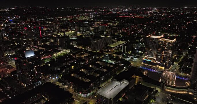 San Jose California Aerial v4 cinematic birds eye view drone flyover downtown capturing illuminated cityscape and buzzing streets at night from above - Shot with Mavic 3 Cine - June 2022