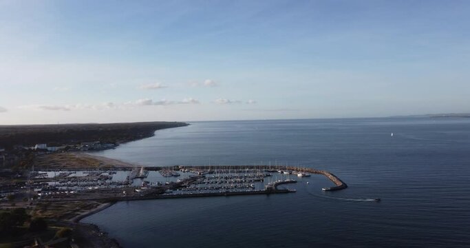 View of the North Sea in Helsingor, Denmark. In the vicinity of Kronborg Castle. You can see the port and boats plying the sea. In front is Sweden.