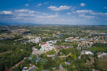 Fototapeta na wymiar Aerial view of an amusement park on Lake Garda, Italy. Aerial panorama of landmarks on Lake Garda.