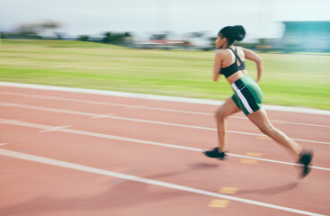 Fototapeta premium Black woman, running and athletics for sports training, cross fit or exercise on stadium track in the outdoors. African American female runner athlete in fitness, sport or run for practice workout