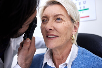 Optometry, eye check and woman with an optician for healthcare, consultation and vision exam. Lens...