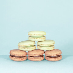 Sweet and colourful french macaroons on retro-vintage background