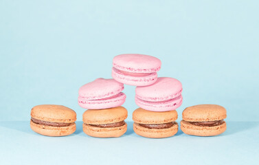 Multicolored French macaron cookies close-up.