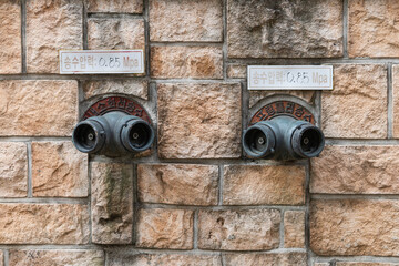 an old water pipe attached to the wall