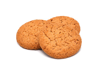 Three oatmeal cookies isolated on a white background