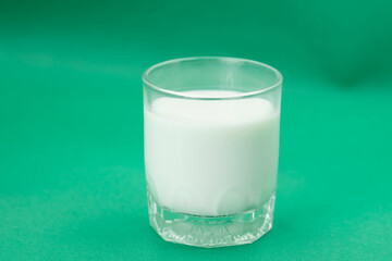 Glass of milk Isolated on a color background. Dairy product close-up. Drink milk for a good health. Cow milk. good product of social. copy space for text.