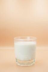 Glass of milk Isolated on a color background. Dairy product close-up. Drink milk for a good health. Cow milk. good product of social. copy space for text.