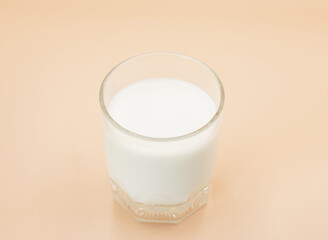 Glass of milk Isolated on a color background. Dairy product close-up. Drink milk for a good health. Cow milk. good product of social. copy space for text.