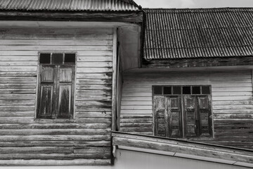 Black and white Ancient thai style house The walls and windows are made of wood