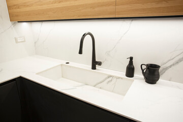 Modern high end luxury kitchen with marble work tops
