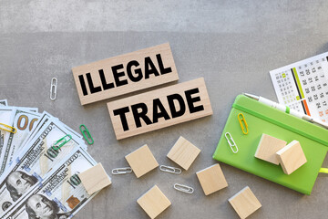 Illegal Trading top view on wooden blocks. text in black font
