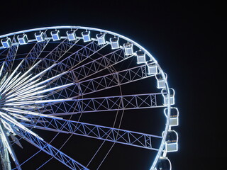 BANGKOK - February 5: Night scene of the Large Ferris wheel in Asiatique, open outdoor community shopping mall in Bangkok, Thailand, under dark night sky, on February 5, 2023.