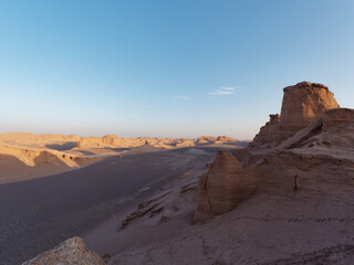 Fototapeta na wymiar Scenic view of the beautiful Dasht-e Lut Desert and its rock formations (Kaluts) in Kerman province, Iran