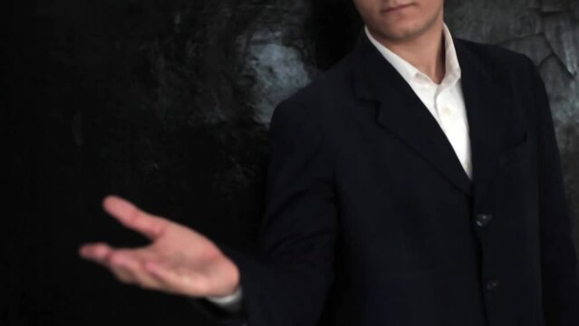 A young Businessman in a blue suit showing his palm expressing stop denial emotion through his body language, Hd footage.