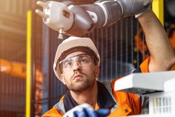 Automation Engineer Service checking Robotic Arm. New Era Modern Machine Automatic Manufacturing...