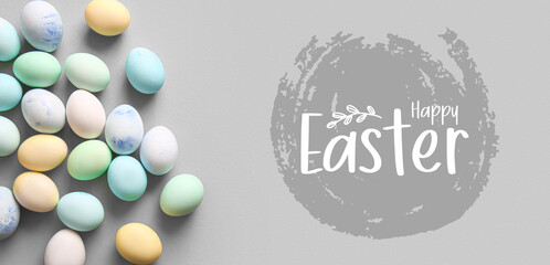 Greeting card for Easter celebration with painted eggs on grey background