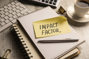 Impact factor is written on paper.