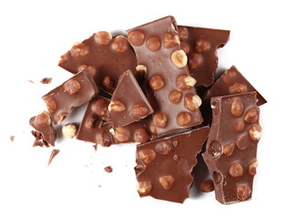 Chocolate bars with hazelnut, pieces isolated on white background, top view