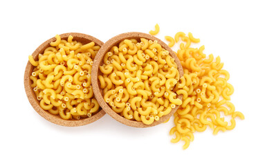 Plates of raw elbow pasta on white background