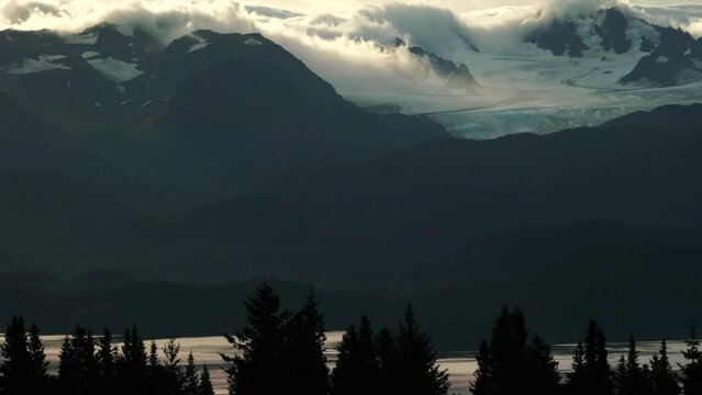 8 second time lapse of clouds rolling over the mountains and glaciers  in Homer, Alaska