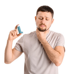 Sick man with inhaler on white background