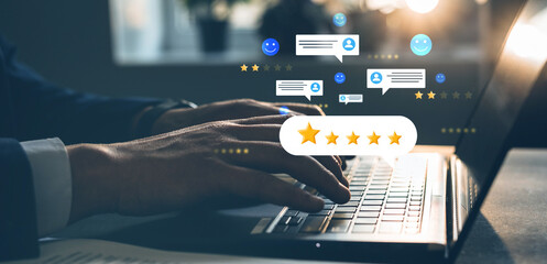 Man who gives leave feedback on the bought product with gold five star rating feedback on virtual sreen. Customer review satisfaction feedback.Concept of satisfaction, quality and performance.  - obrazy, fototapety, plakaty